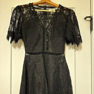 Lovers and Friends Lace Black Romper Size XS, Flutter Sleeve w/ Sheer detailing